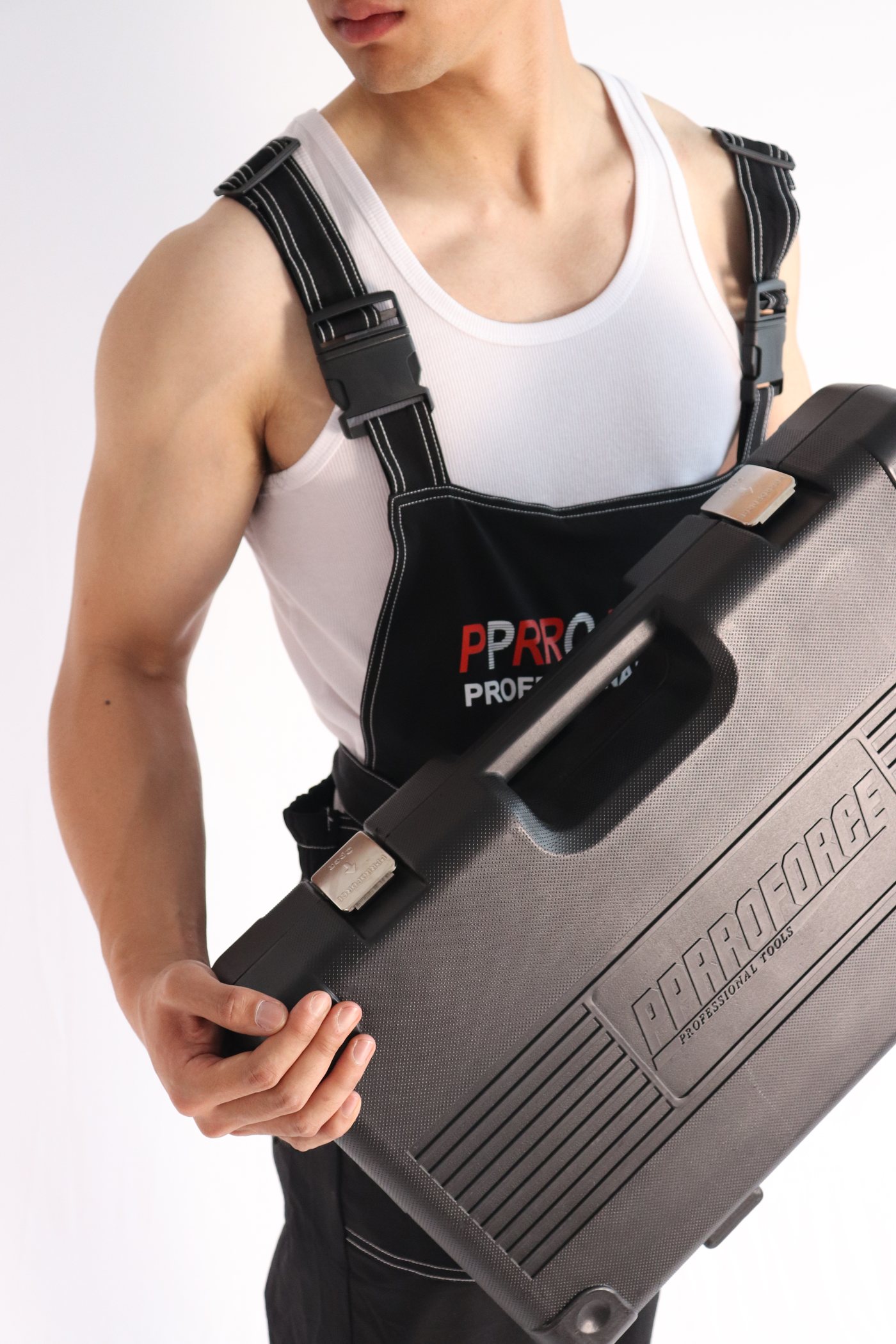 PPRROFORCE branded work apron and embossed tool case, studio shot